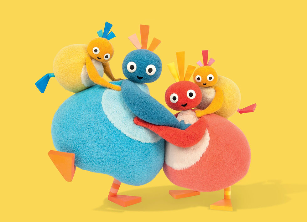 big blue and red characters with two little yellow characters all dance on a yellow background