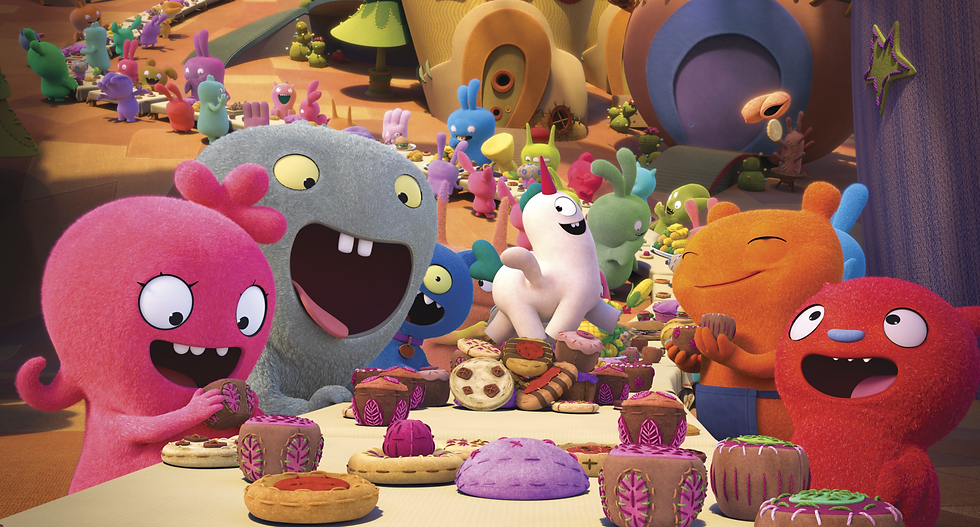 a group of colourful characters sit around a table having snacks