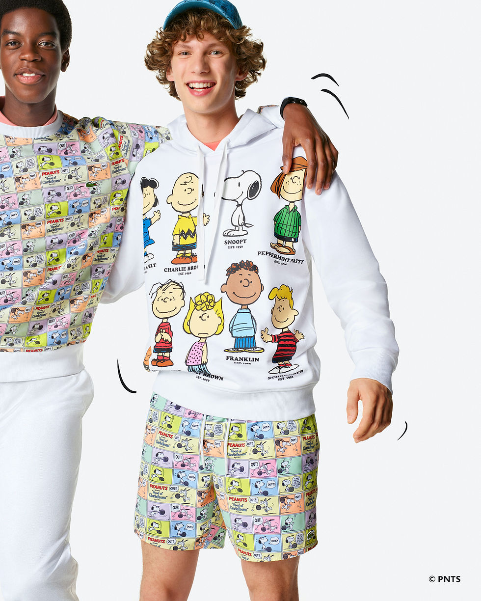 two young men dressed in casual clothes - sweats and shorts