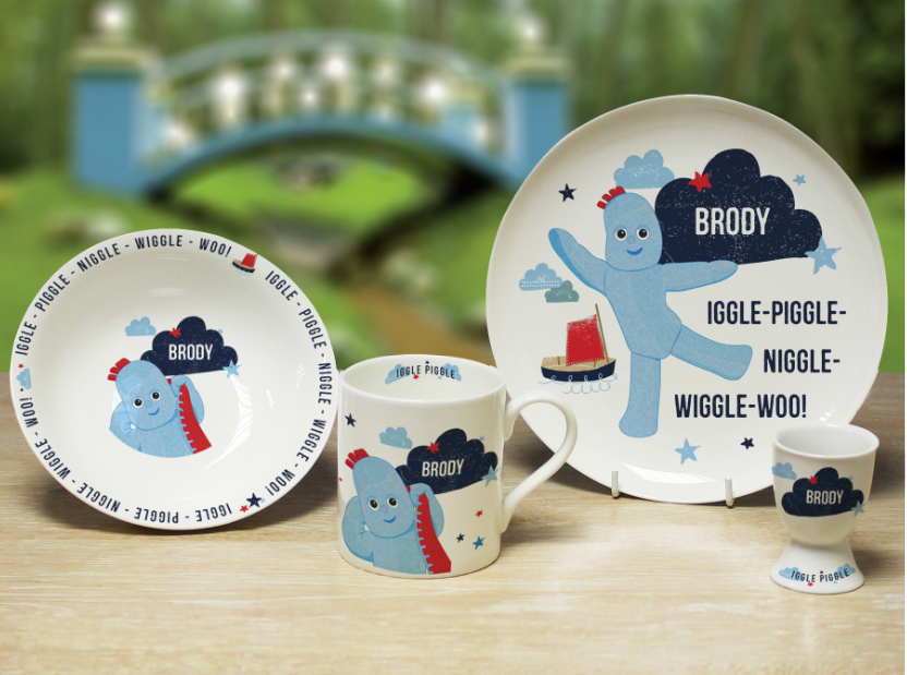 plates and mugs with Brody, blue alien like animated character