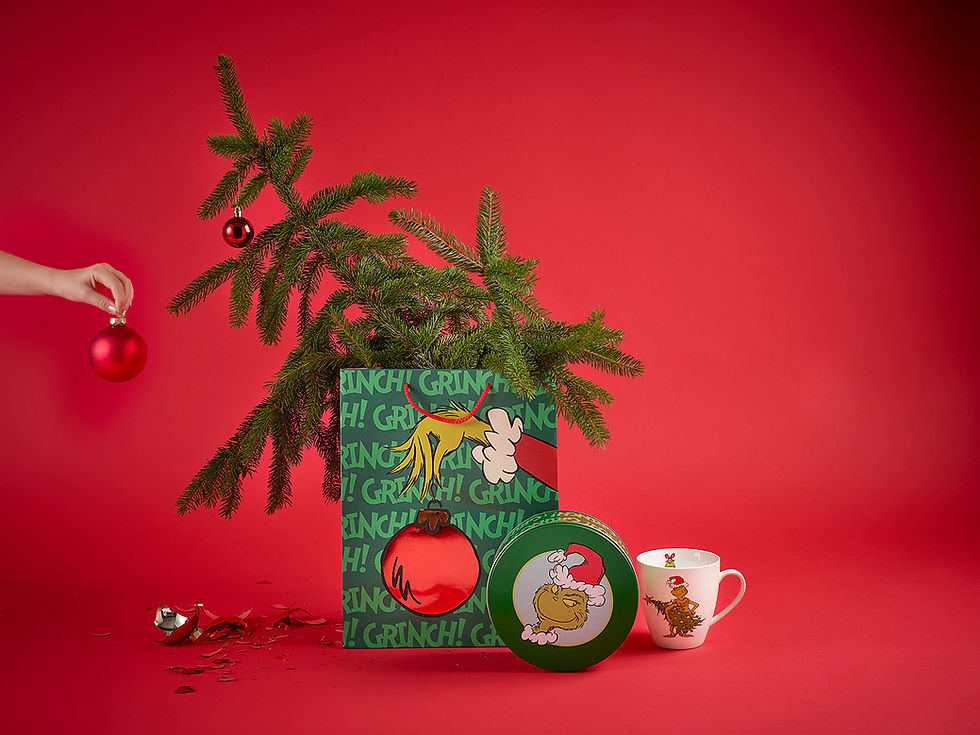 a placement of various christmas themed items on the red background
