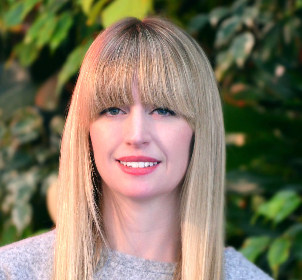 headshot of a woman with long hair