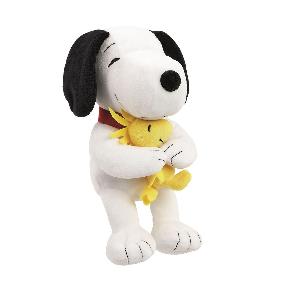 a stuff toy in a shape of a beagle dog holding a yellow bird