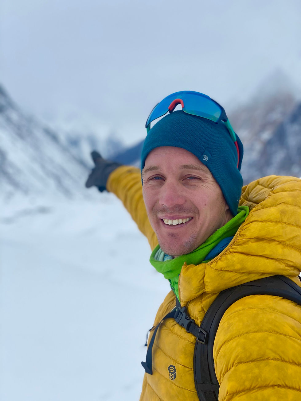 Extreme adventurer Colin O'Brady smiles as he explores the Arctic