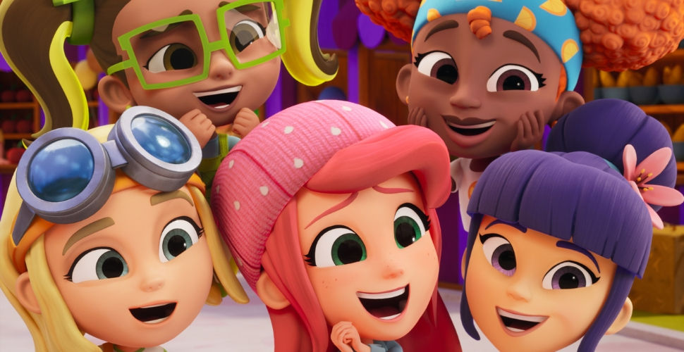 Strawberry Shortcake and four of her friends gathered around with big smiles.