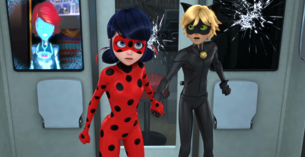 young woman wearing a red bodysuit with black polka dots and a young man wearing a black bodysuit and cat ears