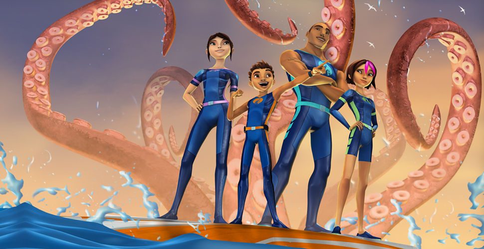 4 people in blue uniforms stand in front of giant octopus arms waving around