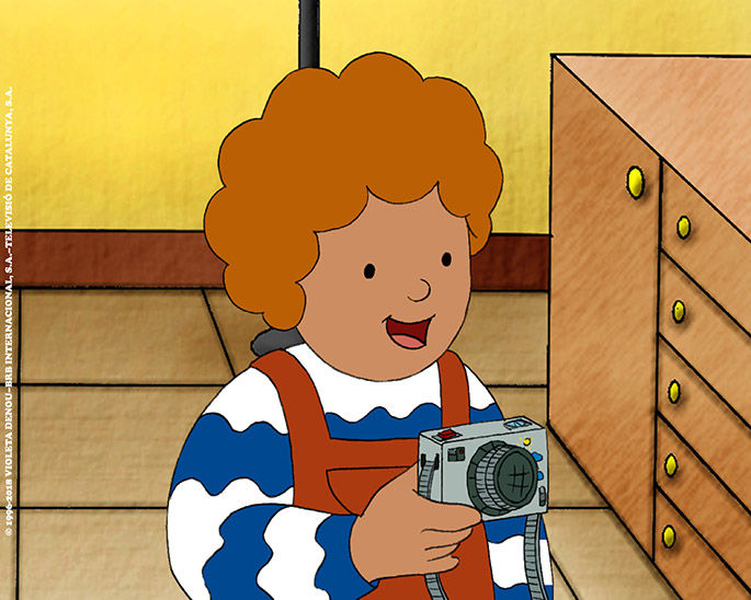 animated boy holding a camera